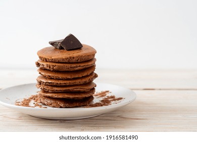 Chocolate Pancake Stack With Chocolate Powder