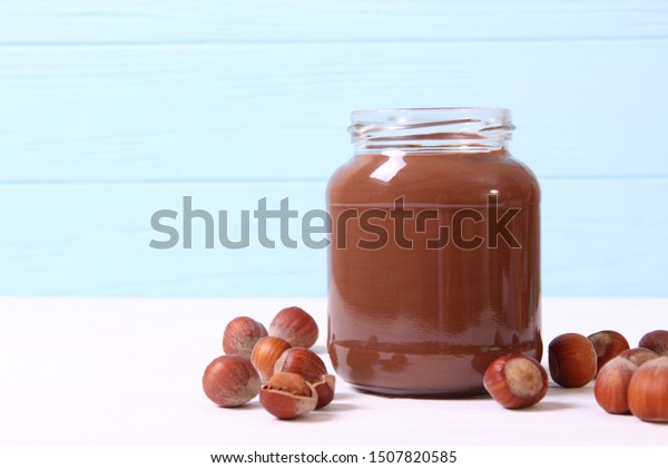 Download Chocolate Paste Glass Jar On Colored Stock Photo Edit Now 1507820585 PSD Mockup Templates