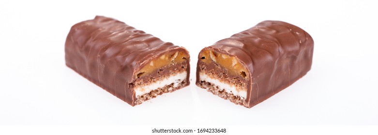 Chocolate Peanut Butter Energy Bar With Peanuts Isolated On White