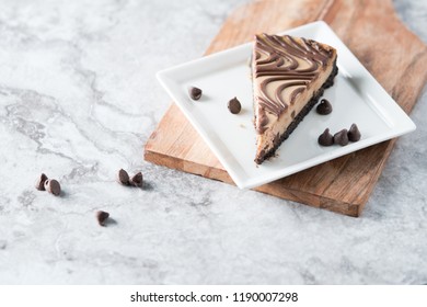 Chocolate Peanut Butter Swirl Cheesecake Dessert