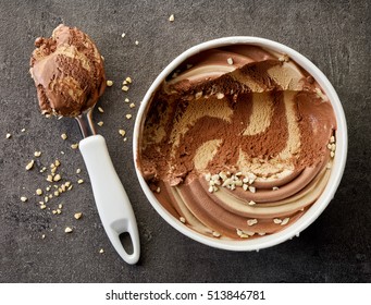 Chocolate And Peanut Ice Cream On Dark Gray Table, Top View