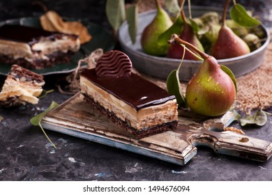 Chocolate pear cake isolated with fruit pear decoration background 
