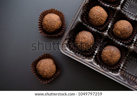 chocolate petit four sweets in wrapper