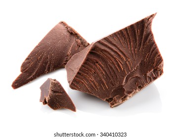 Chocolate pieces isolated on white.