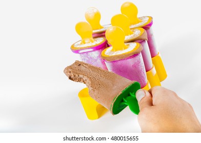 chocolate popsicle in multiple collor boxes