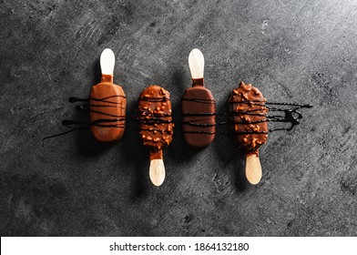 Chocolate Popsicles On Black Background