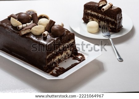  chocolate prestige cake, coconut and condensed milk , cake slice on a plate

