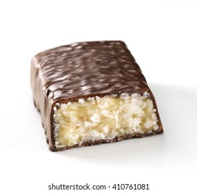 Chocolate Protein Bar, Stuffed With Coconut, Cut On A White Background