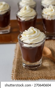 Chocolate Pudding Serve In Shot Glass Put On White Table