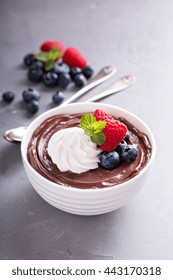 Chocolate Pudding With Whipped Cream And Fresh Berries