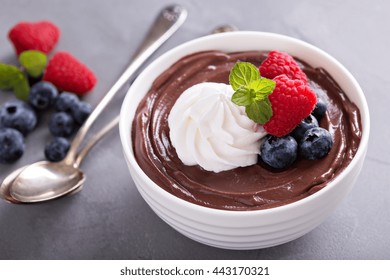 Chocolate Pudding With Whipped Cream And Fresh Berries