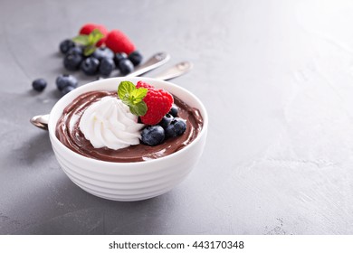 Chocolate Pudding With Whipped Cream And Fresh Berries