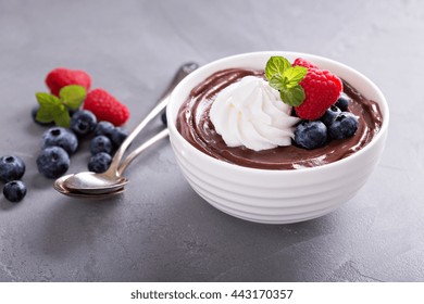 Chocolate Pudding With Whipped Cream And Fresh Berries