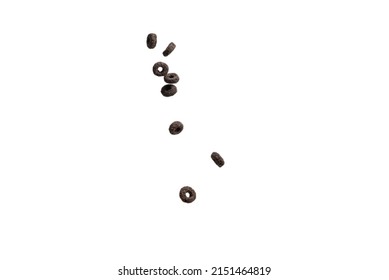 Chocolate Rings Cereal Spill Out Into A Bowl. Breakfast. Isolated On A White Background. 