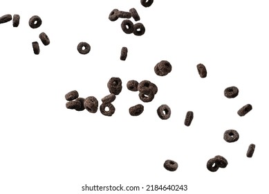 Chocolate Rings Cereal Spill Out Into A Bowl. Breakfast. Isolated On A White Background. 