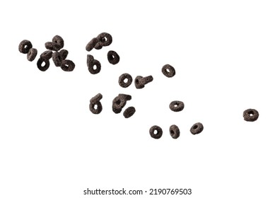 Chocolate Rings Cereal Spill Out Into A Bowl. Breakfast. Isolated On A White Background. 