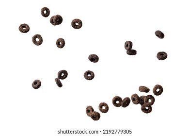 Chocolate Rings Cereal Spill Out Into A Bowl. Breakfast. Isolated On A White Background. 