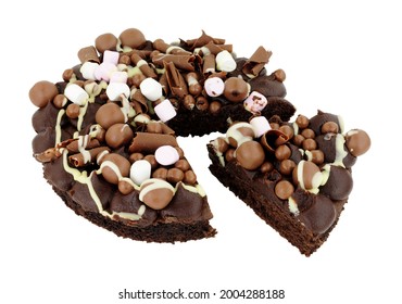 Chocolate Rocky Road Dessert Sponge Cake Decorated With Chocolate Balls And Marshmallows Isolated On A White Background