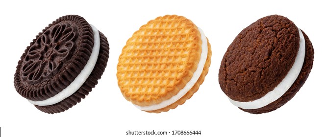 Chocolate sandwich cookies, baked biscuits stuffed with milk cream isolated on white background with clipping path, collection - Shutterstock ID 1708666444