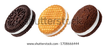 Chocolate sandwich cookies, baked biscuits stuffed with milk cream isolated on white background with clipping path, collection