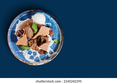 Chocolate Savory Dessert With Ice Cream On A Vintage Blue Plate On A Clean Blue Background, Confectionery Banner
