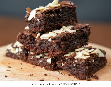 Chocolate shiny crust brownie. Topping almond, chocolate and cheese. Chocolate cake  for your tea and coffee time . Combination of sugar, flour, chocolate, and eggs