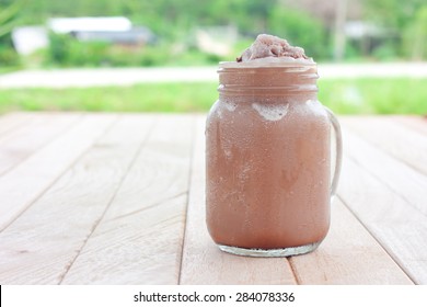 chocolate smoothie on a wooden table