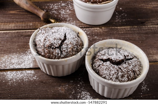 Chocolate souffle home, baked in oven from hight\
quality cocoa
