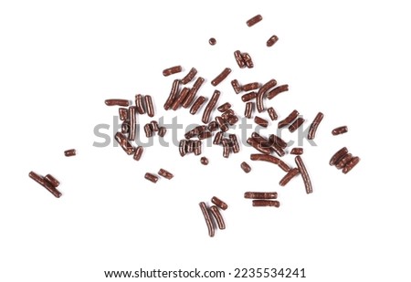Chocolate sprinkles pile, granules isolated on white, top view 