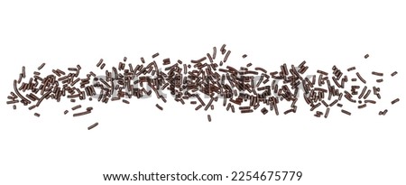Chocolate sprinkles pile, granules line isolated on white, top view 