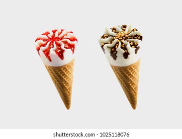 Chocolate and strawberry sorts of Ice Cream in a waffles isolated on grey background 