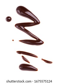 Chocolate Syrup Drizzle Isolated On White Background. Splashes Of Sweet Chocolate Sauce. Top View.