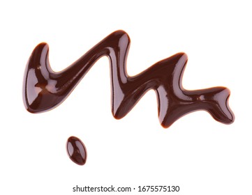 Chocolate Syrup Drizzle Isolated On White Background. Splashes Of Sweet Chocolate Sauce. Top View.