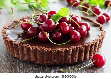 Chocolate Tart With Fresh Cherry.