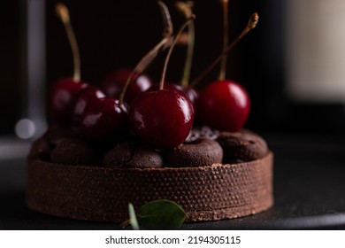 Chocolate Tart With Ganache Decorated With Fresh Cherry