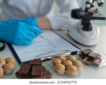 Chocolate testing process in a laboratory with various samples and equipment present during analysis