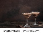 Chocolate Truffle Martini Cocktail on dark wooden background, copy space. Mudslide Truffletini cocktail recipe.