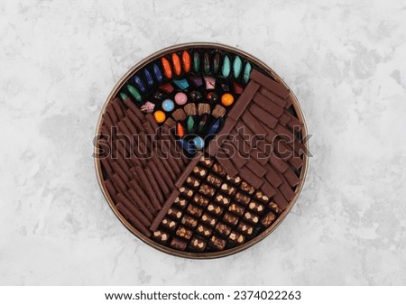 Chocolate Truffles, Chocolate candies, A set of assorted chocolates candies in gift box, concreat background ,top view 