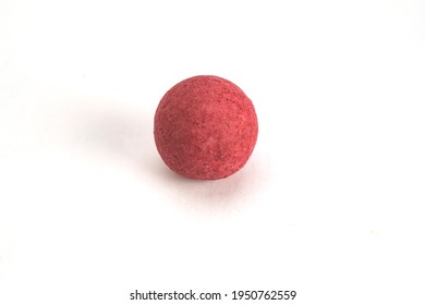 chocolate truffles covered with raspberry isolated on white background - Shutterstock ID 1950762559
