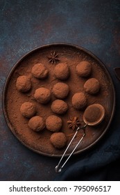 Chocolate Truffles On Dark Blue Background, Top View