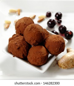 Chocolate Truffles On White Plate