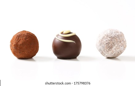 Chocolate Truffles On White Plate