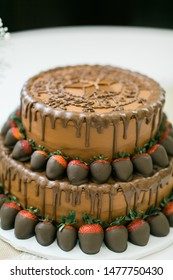 Chocolate Two Tier Groomsmen Cake With Chocolate Covered Strawberries 