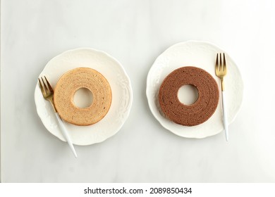 Chocolate and Vanilla Baumkuchen or Tree Cake (Log Cake) is a Kind of Spit Cake from German Cuisine. It's also a Popular Dessert in Japan. Copy Space for Text