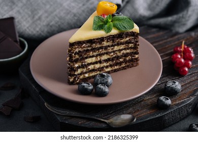 Chocolate Vanilla Cake With Berries On Plate