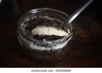 A Chocolate And Vanilla Dessert In A Glass Ramekin.