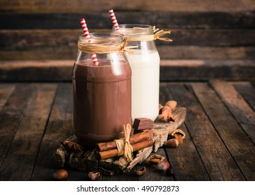 Chocolate And Vanilla Milkshake In The Glass Jar 