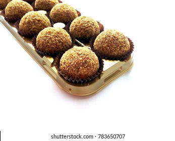 Chocolate Walnut Balls On A Golden Tray. Delicious Guilty Pleasure.