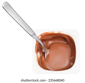 chocolate yogurt and spoon in disposable plastic cup isolated on white background