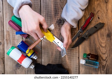 The choice of angle for sharpening the knife. Sharpening the knife at the correct angle. Angle for a sharp knife. - Shutterstock ID 2255140277